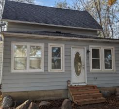 112 2nd St, Kiester, MN 56051 - view of front facade featuring entry steps and roof with shingles