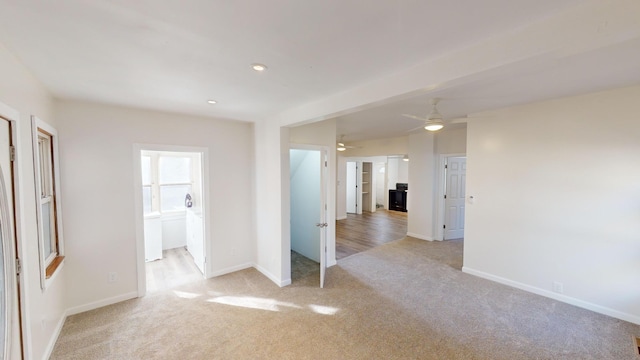 112 2nd St, Kiester, MN 56051 - unfurnished room featuring light colored carpet, ceiling fan, and recessed lighting