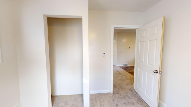 112 2nd St, Kiester, MN 56051 - hallway featuring light carpet