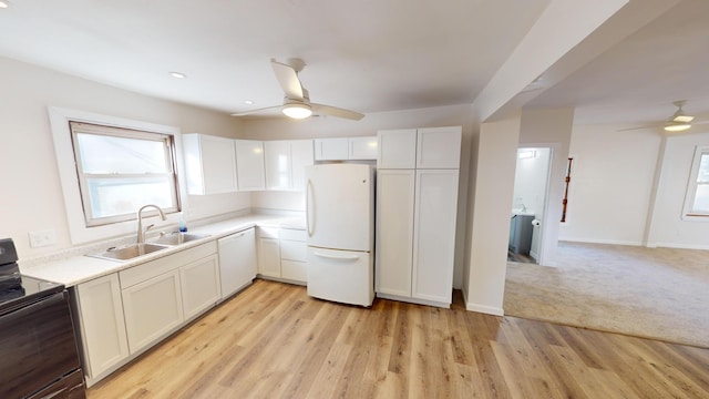 112 2nd St, Kiester, MN 56051 - kitchen featuring white appliances, ceiling fan, and plenty of natural light