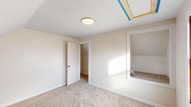 112 2nd St, Kiester, MN 56051 - empty room with carpet floors and lofted ceiling