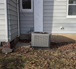 112 2nd St, Kiester, MN 56051 - exterior view of a cooling unit