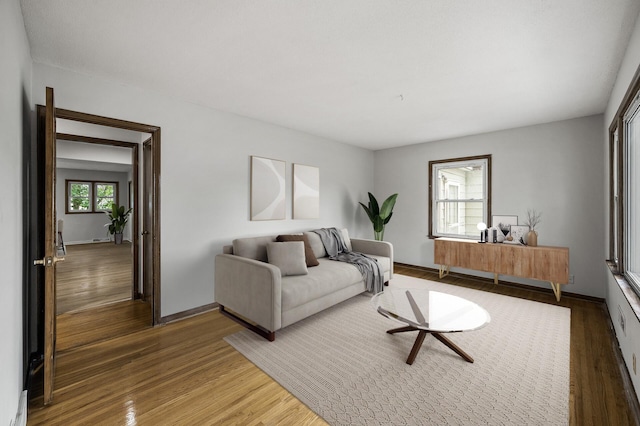 8235 Nicollet Ave S, Bloomington, MN 55420 - living room featuring wood finished floors and baseboards