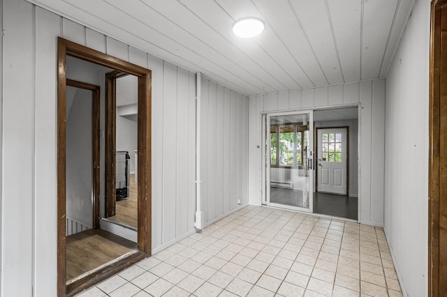 8235 Nicollet Ave S, Bloomington, MN 55420 - empty room featuring light tile patterned floors and wooden walls