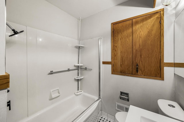 8235 Nicollet Ave S, Bloomington, MN 55420 - bathroom with toilet, bathing tub / shower combination, and tile patterned floors