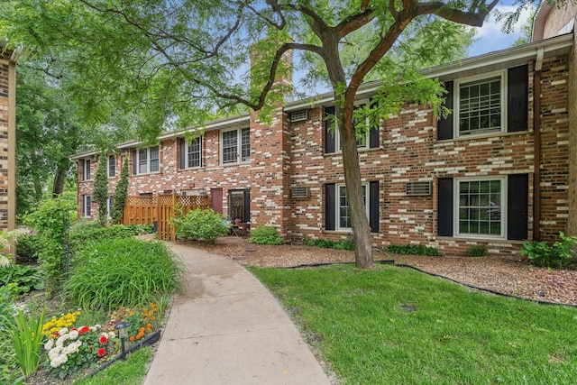 4584 Cedar Lake Rd S Unit 1, Saint Louis Park, MN 55416 - view of front facade with brick siding and a front lawn