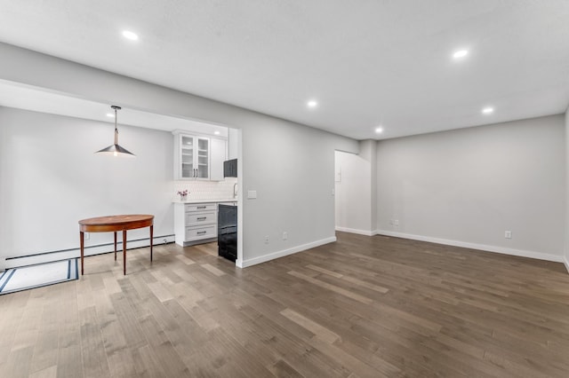 4584 Cedar Lake Rd S Unit 1, Saint Louis Park, MN 55416 - unfurnished living room with recessed lighting and wood finished floors
