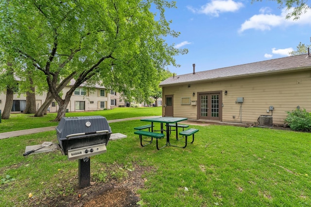 4584 Cedar Lake Rd S Unit 1, Saint Louis Park, MN 55416 - view of green lawn featuring french doors
