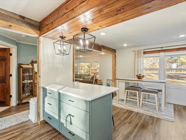 5335 Pine Beach Rd, Brainerd, MN 56401 - kitchen with green cabinetry, dark wood-style floors, plenty of natural light, light countertops, and recessed lighting