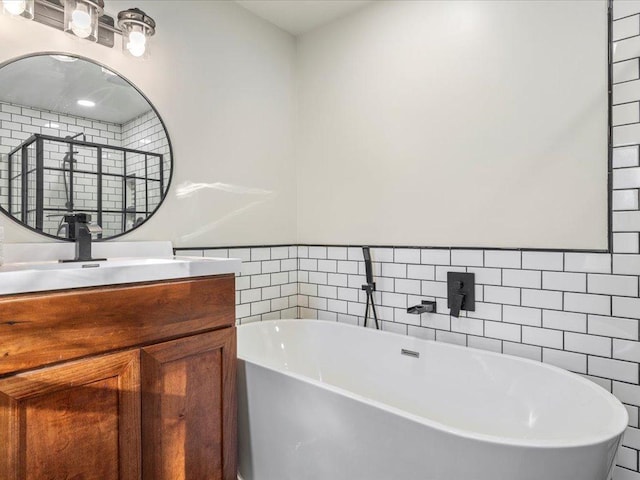 5335 Pine Beach Rd, Brainerd, MN 56401 - bathroom featuring tile walls, a soaking tub, vanity, and a shower stall