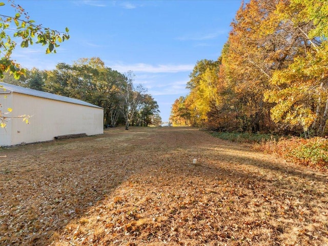 5335 Pine Beach Rd, Brainerd, MN 56401 - view of yard featuring an outbuilding and an outdoor structure