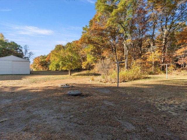 5335 Pine Beach Rd, Brainerd, MN 56401 - view of yard featuring an outdoor structure and an outbuilding