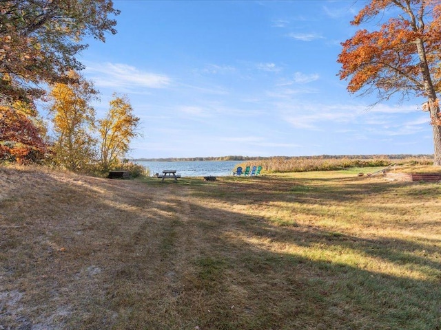 5335 Pine Beach Rd, Brainerd, MN 56401 - view of green lawn featuring a water view