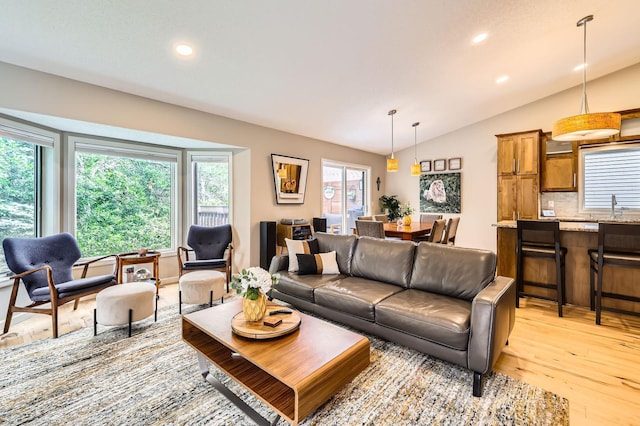 5691 Birch Trl, Shoreview, MN 55126 - living area with light wood-style floors, recessed lighting, and lofted ceiling