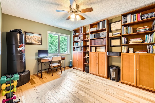 5691 Birch Trl, Shoreview, MN 55126 - office space with ceiling fan, light wood-style floors, a textured ceiling, and baseboards