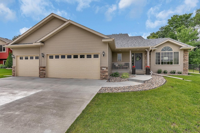 823 Morningside Loop, Saint Joseph, MN 56374 - ranch-style house featuring a garage, stone siding, concrete driveway, a front lawn, and covered porch