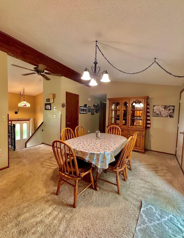 4488 Konieska Rd, Moose Lake, MN 55767 - dining area featuring light carpet, a chandelier, a textured ceiling, beamed ceiling, and a ceiling fan
