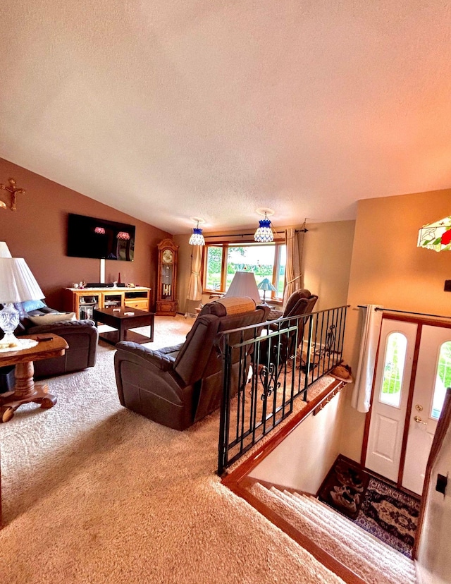 4488 Konieska Rd, Moose Lake, MN 55767 - living room with carpet flooring, a textured ceiling, and lofted ceiling
