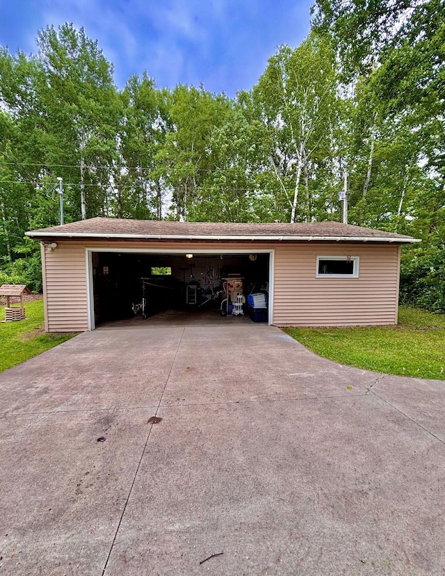 4488 Konieska Rd, Moose Lake, MN 55767 - detached garage with view of scattered trees