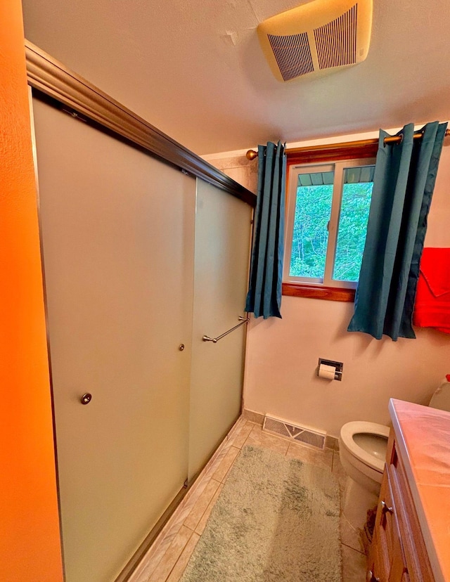 4488 Konieska Rd, Moose Lake, MN 55767 - bathroom featuring vanity, tile patterned floors, and an enclosed shower