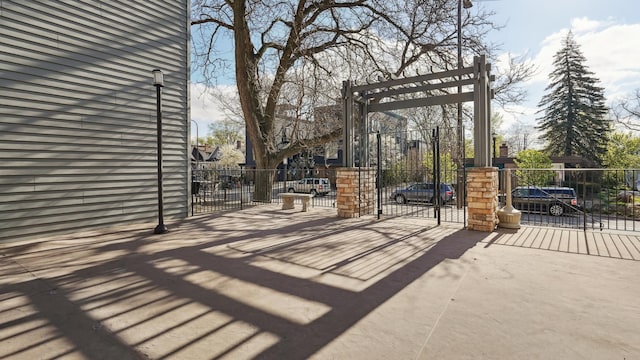 3540 Hennepin Ave Unit 309, Minneapolis, MN 55408 - view of patio / terrace featuring a gate