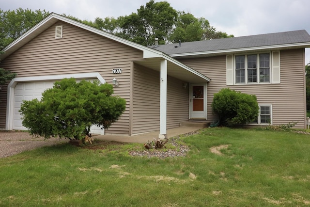 7971 Upper 145th St W, Apple Valley, MN 55124 - view of front of property featuring an attached garage and a front yard