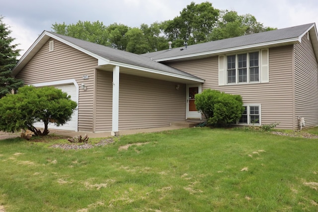 7971 Upper 145th St W, Apple Valley, MN 55124 - view of side of property with an attached garage and a yard