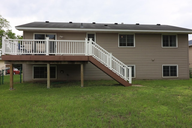 7971 Upper 145th St W, Apple Valley, MN 55124 - rear view of house featuring a deck, a lawn, and stairs