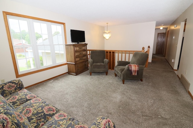 7971 Upper 145th St W, Apple Valley, MN 55124 - living area featuring carpet flooring and a chandelier