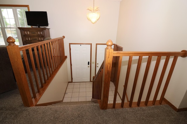 7971 Upper 145th St W, Apple Valley, MN 55124 - stairs featuring carpet and tile patterned floors