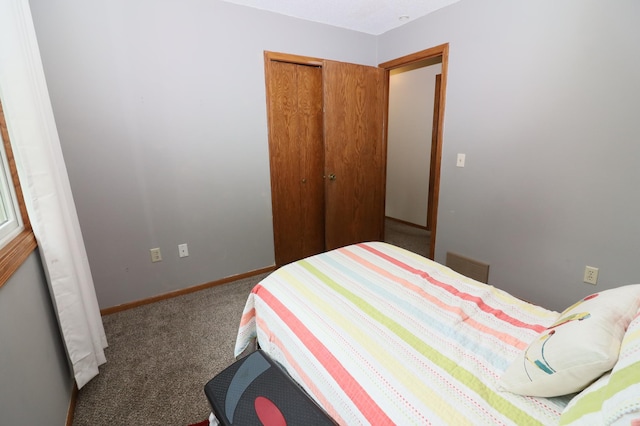 7971 Upper 145th St W, Apple Valley, MN 55124 - carpeted bedroom with a closet and baseboards