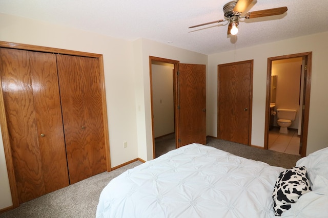 7971 Upper 145th St W, Apple Valley, MN 55124 - carpeted bedroom with ensuite bath and a ceiling fan