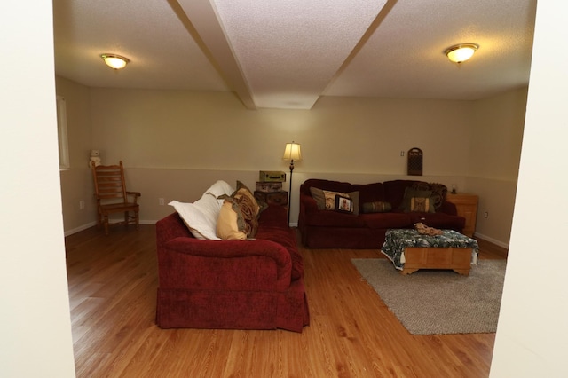7971 Upper 145th St W, Apple Valley, MN 55124 - living area with wood finished floors and a textured ceiling