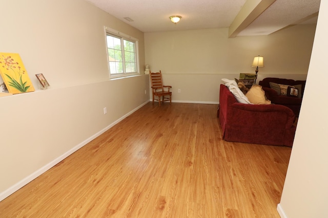 7971 Upper 145th St W, Apple Valley, MN 55124 - sitting room with light wood finished floors and baseboards