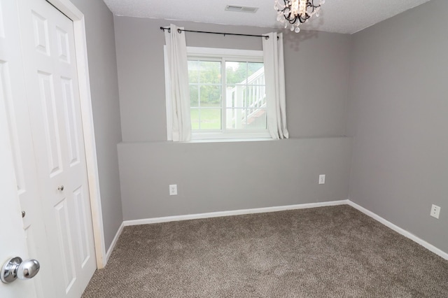 7971 Upper 145th St W, Apple Valley, MN 55124 - spare room featuring carpet and a chandelier