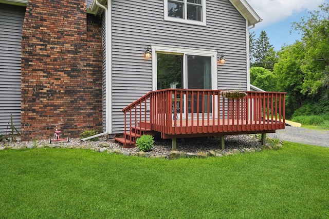 2256 40th Ave Unit X, East Farmington, WI 54020 - rear view of house with a yard and a deck