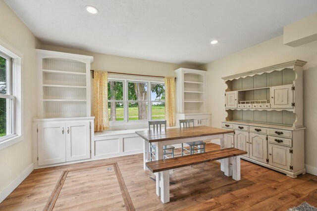 2256 40th Ave Unit X, East Farmington, WI 54020 - dining area featuring healthy amount of natural light, light wood-type flooring, and recessed lighting