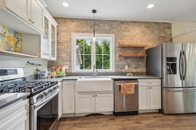 2256 40th Ave Unit X, East Farmington, WI 54020 - kitchen featuring appliances with stainless steel finishes, a sink, open shelves, white cabinetry, and recessed lighting