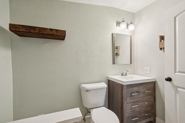 2256 40th Ave Unit X, East Farmington, WI 54020 - bathroom with vanity and toilet