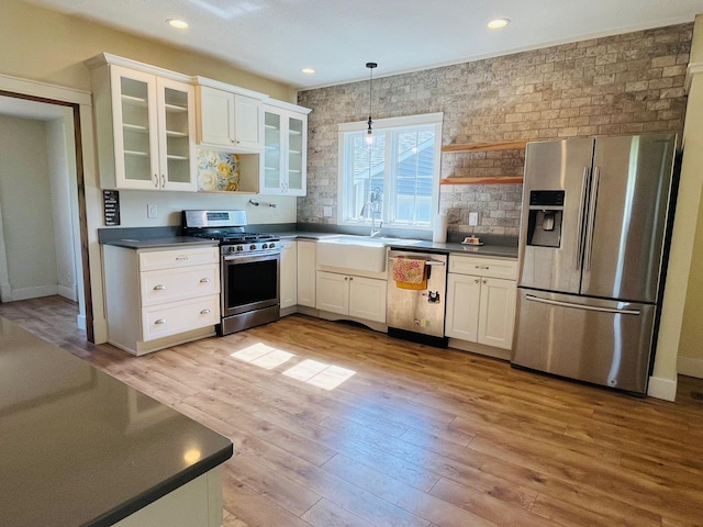 2256 40th Ave, East Farmington, WI 54020 - kitchen with stainless steel appliances, open shelves, dark countertops, white cabinets, and recessed lighting