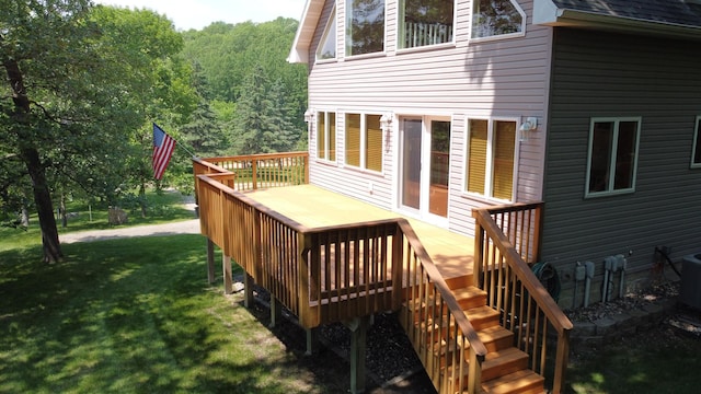 32813 Whispering Springs Loop, Erhard, MN 56534 - wooden terrace featuring a yard and stairway