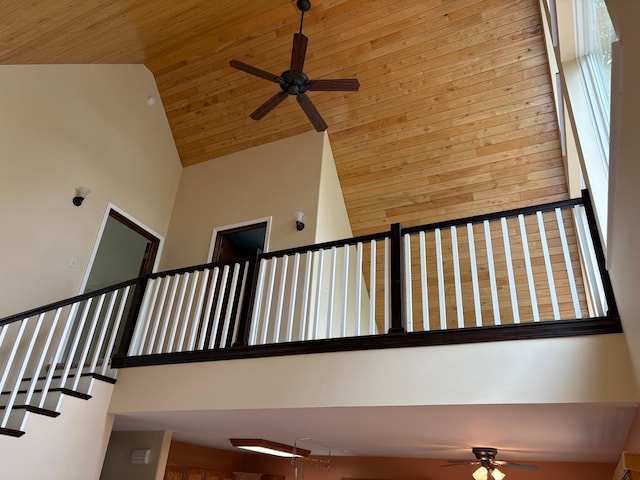 32813 Whispering Springs Loop, Erhard, MN 56534 - stairs with high vaulted ceiling, a ceiling fan, wood ceiling, and healthy amount of natural light