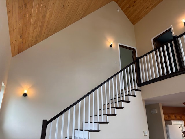 32813 Whispering Springs Loop, Erhard, MN 56534 - staircase with high vaulted ceiling and wooden ceiling