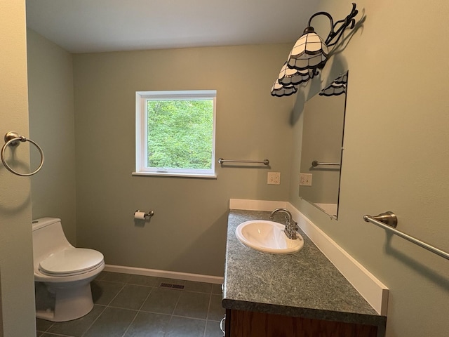 32813 Whispering Springs Loop, Erhard, MN 56534 - half bathroom with vanity and tile patterned floors