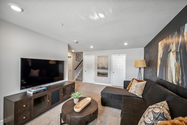 19981 62nd Pl, Corcoran, MN 55340 - living area with light carpet, stairs, a textured ceiling, and recessed lighting