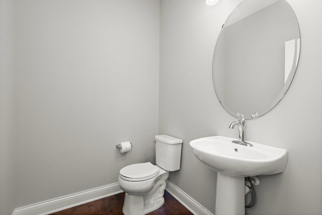 15827 Ethan Trl N, Hugo, MN 55038 - bathroom with baseboards, wood finished floors, and toilet