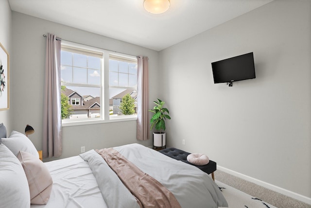 15827 Ethan Trl N, Hugo, MN 55038 - carpeted bedroom featuring baseboards