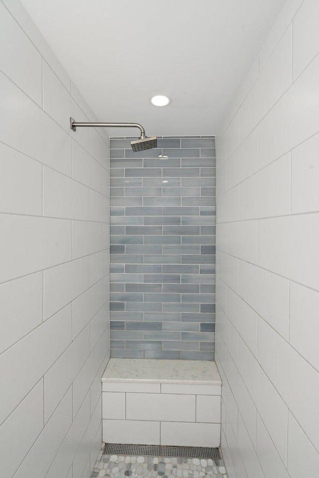 15827 Ethan Trl N, Hugo, MN 55038 - full bath featuring a tile shower, tile walls, and recessed lighting