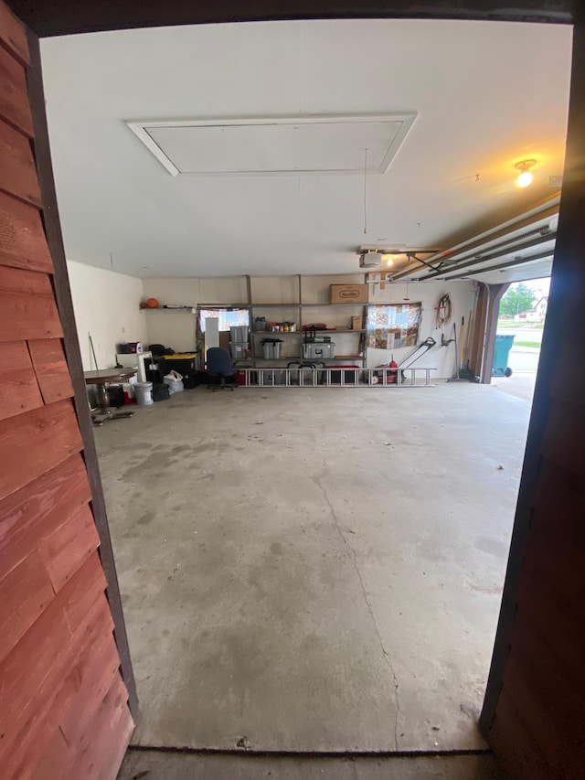 8 Dayton Ave SE, Wadena, MN 56482 - garage featuring a garage door opener