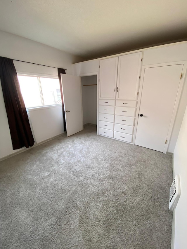 8 Dayton Ave SE, Wadena, MN 56482 - unfurnished bedroom with light carpet